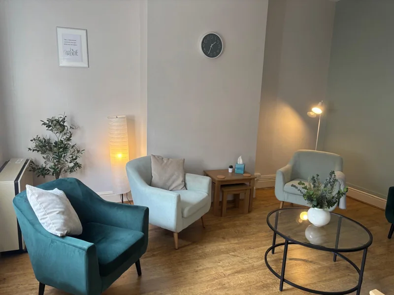 Comfortable chairs and soft lighting in Solace